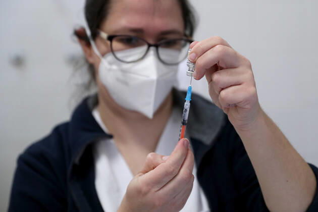 February 18, 2021, Lisbon, Portugal: A health technician fills up a syringe with a dose of the Pfizer-BioNTech Covid-19 vaccine at Sao Domingos de Rana sports complex, in Cascais, Portugal, on February 18, 2021. Portugal continues with the first phase of inoculation against COVID-19 for citizens over 80 or belonging to risk groups as the number of new officially confirmed COVID-19 cases has been falling since the end of January. Lisbon Portugal - ZUMAf123 20210218_zap_f123_013 Copyright: xPedroxFiuzax
