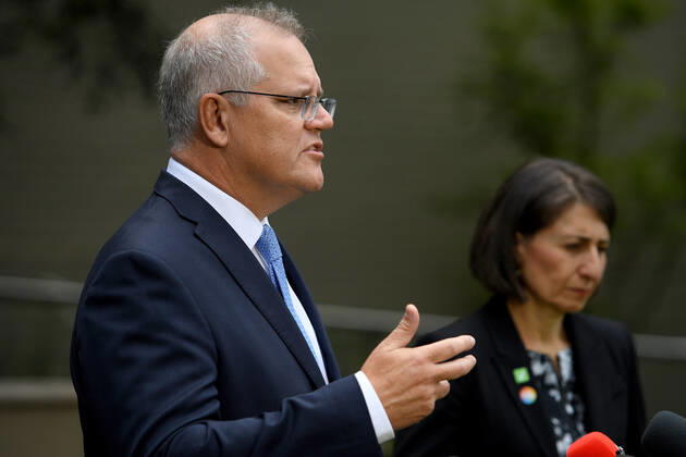 SCOTT MORRISON VACCINE HOSPITAL TOUR, Prime Minister Scott Morrison and NSW Premier Gladys Berejiklian address media following a tour of a COVID-19 vaccination hub at Royal Prince Alfred hospital in Sydney, Friday, February 19, 2021. The first COVID-19 vaccinations in NSW will take place on Monday, with the Pfizer jab to go out to frontline workers. ( NO ARCHIVING, EDITORIAL USE ONLY, NO USE IN BOOKS WITHOUT CONSENT Sydney NSW AUSTRALIA  Copyright: xDANxHIMBRECHTSx 20210219001521593846