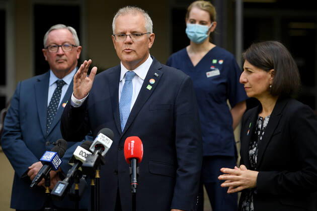 SCOTT MORRISON VACCINE HOSPITAL TOUR, Prime Minister Scott Morrison and NSW Premier Gladys Berejiklian address media following a tour of a COVID-19 vaccination hub at Royal Prince Alfred hospital in Sydney, Friday, February 19, 2021. The first COVID-19 vaccinations in NSW will take place on Monday, with the Pfizer jab to go out to frontline workers. ( NO ARCHIVING, EDITORIAL USE ONLY, NO USE IN BOOKS WITHOUT CONSENT Sydney NSW AUSTRALIA  Copyright: xDANxHIMBRECHTSx 20210219001521595084