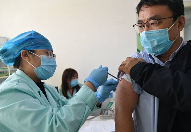 February 19, 2021, Shijiazhuang, Hebei, China: People are getting the second needle of COVID-19 vaccine in Shijiazhuang,Hebei,China on 19th February, 2021. Shijiazhuang China - ZUMAt151 20210219_zia_t151_011 Copyright: xTpgx