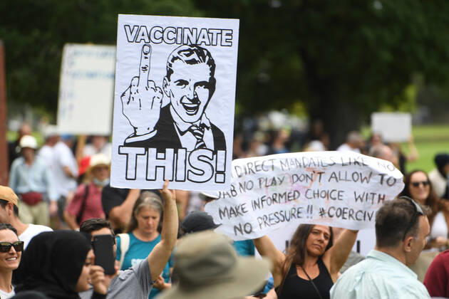 ANTI VACCINATION RALLY MELBOURNE, A sign is seen during an anti-vaccination rally in Melbourne, Saturday, February 20, 2021. The national rollout of the Pfizer vaccine will begin on Monday in what will be the largest exercise of its kind in Australia s history. ( NO ARCHIVING, EDITORIAL USE ONLY, NO USE IN BOOKS WITHOUT CONSENT MELBOURNE VIC AUSTRALIA  Copyright: xERIKxANDERSONx 20210220001521827606