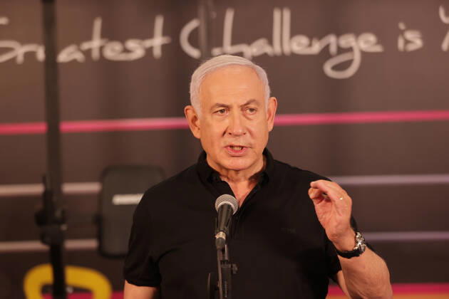 Israeli Prime Minister Benjamin Netanyahu visits a fitness gym ahead of the re-opening of the branch in Petah Tikva, Israel on Saturday, February 20, 2021, Israel continues lifting the lockdown with the opening of gyms, hotels, and shopping centers starting February. 21. Pool photo by Tal Shahar  JERX20210220203 TalxShahar