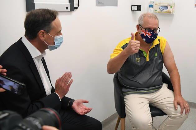 SCOTT MORRISON COVID19 VACCINATION, Australian Prime Minister Scott Morrison gestures after receiving his COVID-19 vaccination during a visit to Castle Hill Medical Centre to preview the COVID-19 vaccination program on Sunday, February 21, 2021. The PM has received a COVID-19 vaccination, joining a small group of people who are the first in Australia to receive a jab. ( NO ARCHIVING, EDITORIAL USE ONLY, NO USE IN BOOKS WITHOUT CONSENT SYDNEY NSW AUSTRALIA Copyright: xJOELxCARRETTx 20210221001522025816