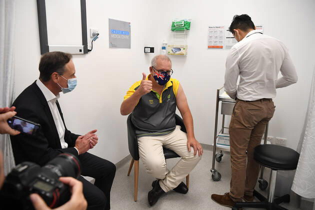 SCOTT MORRISON COVID19 VACCINATION, Australian Prime Minister Scott Morrison gestures after receiving his COVID-19 vaccination during a visit to Castle Hill Medical Centre to preview the COVID-19 vaccination program on Sunday, February 21, 2021. The PM has received a COVID-19 vaccination, joining a small group of people who are the first in Australia to receive a jab. ( NO ARCHIVING, EDITORIAL USE ONLY, NO USE IN BOOKS WITHOUT CONSENT SYDNEY NSW AUSTRALIA Copyright: xJOELxCARRETTx 20210221001522026352