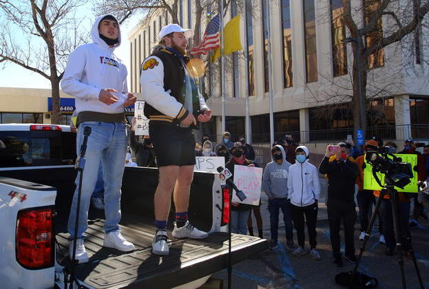 February 21, 2021, ALBUQUERQUE, NEW MEXICO, USA: 022121.Cobloa High School seniors and football players Steven Barela, left and Castle Brownell address the crowd during the protest against the APS Board decision to cancel the season for all athletic activities .Photographed on Sunday February 21, 2021. ALBUQUERQUE USA - ZUMAab1_ 20210221_zaf_ab1_003 Copyright: xAdolphexPierre-Louis Journalx