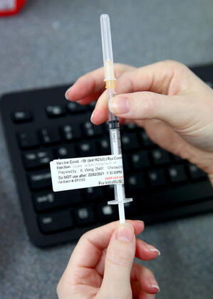 NSW COVID19 VACCINE ROLLOUT, A Pfizer vaccination is seen at the Royal Prince Alfred Hospital Vaccination Hub in Sydney, Monday, February 22, 2021. Australia will begin its roll out of the Pfizer coronavirus vaccine on Monday, the country s most complicated logistical exercise to date. ( NO ARCHIVING, EDITORIAL USE ONLY, NO USE IN BOOKS WITHOUT CONSENT SYDNEY NSW AUSTRALIA  Copyright: xTobyxZernax 20210222001522253703