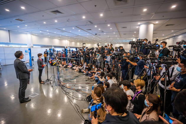 February 22, 2021, Hong Kong, China: Carrie Lam (L2), Hong Kong Chief Executive speaks to the media at the Community Vaccination Centre at the Hong Kong Central Library after getting the COVID-19 vaccination..Hong Kong Chief Executive Carrie Lam and members of her cabinet receive their first dose of of the COVID-19 vaccine in a bid to boost public confidence to the vaccine as the vaccination program for the public will begin on 26th February. Hong Kong China - ZUMAs197 20210222_zaa_s197_005 Copyright: xGeovienxSox