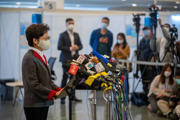 February 22, 2021, Hong Kong, China: Carrie Lam, Hong Kong Chief Executive speaks to the media at the Community Vaccination Centre at the Hong Kong Central Library after getting the COVID-19 vaccination..Hong Kong Chief Executive Carrie Lam and members of her cabinet receive their first dose of of the COVID-19 vaccine in a bid to boost public confidence to the vaccine as the vaccination program for the public will begin on 26th February. Hong Kong China - ZUMAs197 20210222_zaa_s197_012 Copyright: xGeovienxSox