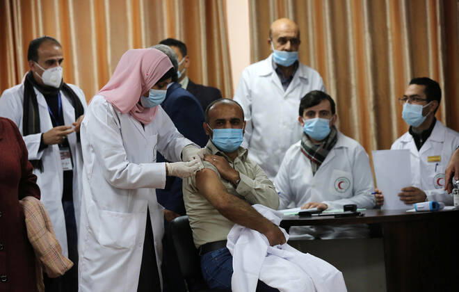 February 22, 2021, Gaza city, Gaza Strip, Palestinian Territory: Palestinian doctors receive the first dose of a COVID-19 vaccine at the Ministry of Health, in Gaza city, on February 22, 2021. Around 20,000 coronavirus vaccine doses from the UAE arrived in Gaza Sunday Gaza city Palestinian Territory - ZUMAap3_ 20210222_zaf_ap3_003 Copyright: xAshrafxAmrax