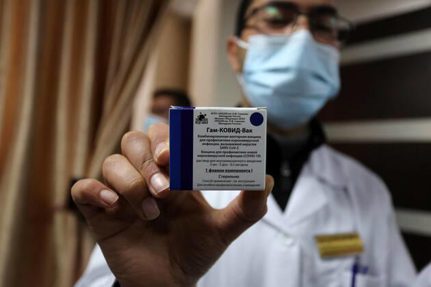 February 22, 2021, Gaza city, Gaza Strip, Palestinian Territory: Palestinian doctors receive the first dose of a COVID-19 vaccine at the Ministry of Health, in Gaza city, on February 22, 2021. Around 20,000 coronavirus vaccine doses from the UAE arrived in Gaza Sunday Gaza city Palestinian Territory - ZUMAap3_ 20210222_zaf_ap3_007 Copyright: xAshrafxAmrax