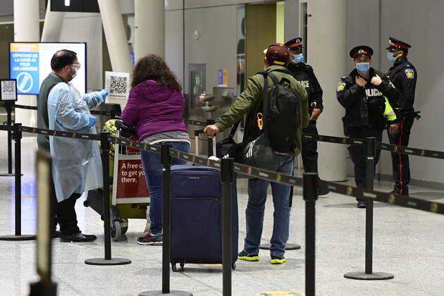 February 22, 2021, Toronto, on, Canada: Travellers, who are not affected by new quarantine rules, arrive at Terminal 3 at Pearson Airport in Toronto early Monday, February 22, 2021. Prime Minister Justin Trudeau announced that all travellers entering Canada by air would have to quarantine in a hotel for three days at their own expense starting later today. Toronto Canada - ZUMAc35_ 20210222_zaf_c35_007 Copyright: xFrankxGunnx