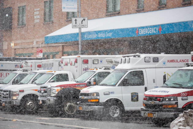 (210223) -- NEW YORK, Feb. 23, 2021 -- Ambulances park in front of Maimonides Medical Center in the Brooklyn Borough of New York, the United States, Feb. 22, 2021. The United States reached the grim milestone of half a million coronavirus deaths on Monday, according to the Center for Systems Science and Engineering (CSSE) at Johns Hopkins University. (Photo by Xinhua) U.S.-NEW YORK-COVID-19-DEATH-HALF A MILLION MichaelxNagle 