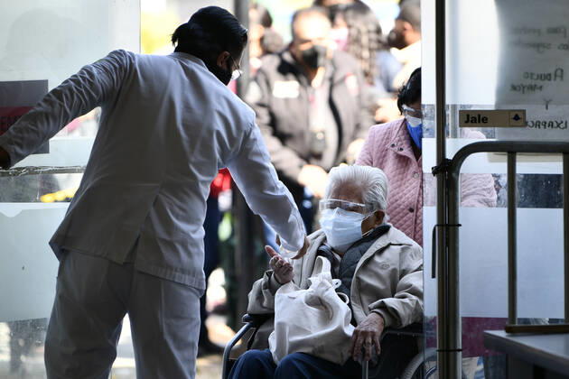 (210223) -- ECATEPEC, Feb. 23, 2021 -- Citizens wait in line to receive the COVID-19 vaccines developed by Chinese pharmaceutical company Sinovac at a vaccination site in Ecatepec, Mexico, Feb. 22, 2021. Mexican health authorities on Monday began to vaccinate older adults with a COVID-19 vaccine developed by Chinese pharmaceutical company Sinovac, after a shipment of doses arrived on Saturday. Mexico s government designated the first shipment of the Sinovac vaccine to arrive in Ecatepec, a city in central State of Mexico that lies on the outskirts of the capital Mexico City. Early in the day, brigades of healthcare workers began to administer the vaccine to hundreds of residents aged 60 and over who went to the Las Americas cultura 