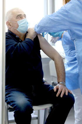 Vaccination in Zagreb, Croatia A man receive coronavirus disease (COVID-19) vaccine during a mass vaccination in Zagreb, Croatia on February 23, 2021 PatrikxMacek PIXSELL
