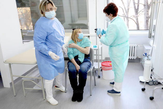 Vaccination in Zagreb, Croatia A woman receive coronavirus disease (COVID-19) vaccine during a mass vaccination in Zagreb, Croatia on February 23, 2021 PatrikxMacek PIXSELL