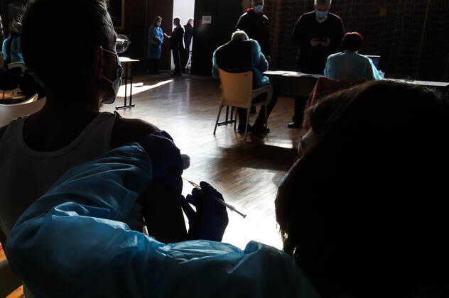 Vaccination in Zagreb, Croatia A woman receive coronavirus disease (COVID-19) vaccine during a mass vaccination in Zagreb, Croatia on February 23, 2021. SanjinxStrukic PIXSELL