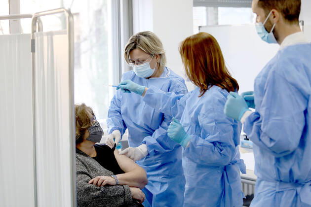 Vaccination in Zagreb, Croatia A woman receive coronavirus disease (COVID-19) vaccine during a mass vaccination in Zagreb, Croatia on February 23, 2021 PatrikxMacek PIXSELL