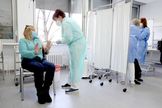 Vaccination in Zagreb, Croatia A woman receive coronavirus disease (COVID-19) vaccine during a mass vaccination in Zagreb, Croatia on February 23, 2021 PatrikxMacek PIXSELL