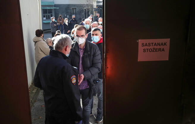 Vaccination in Zagreb, Croatia People wait in line to receive coronavirus disease (COVID-19) vaccine during a mass vaccination in Zagreb, Croatia on February 23, 2021. SanjinxStrukic PIXSELL
