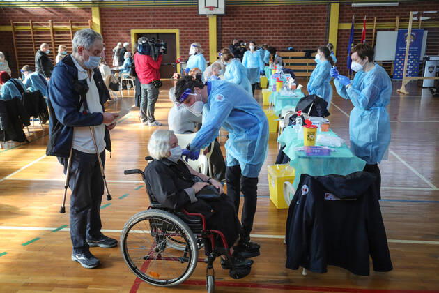 Vaccination in Zagreb, Croatia A woman receive coronavirus disease (COVID-19) vaccine during a mass vaccination in Zagreb, Croatia on February 23, 2021. SanjinxStrukic PIXSELL