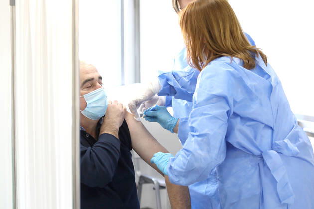 Vaccination in Zagreb, Croatia A man receive coronavirus disease (COVID-19) vaccine during a mass vaccination in Zagreb, Croatia on February 23, 2021 PatrikxMacek PIXSELL