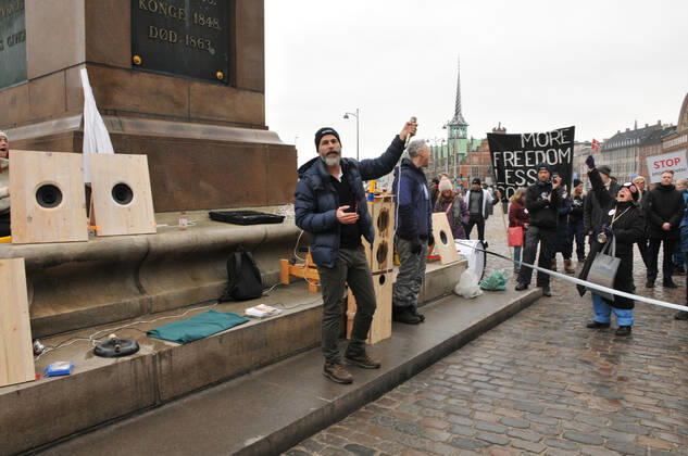 Copenhagen, Denmark. 23 February 2021, Danes proetesting againest coronavirus pandemic new debate in danish parliamenet about quick corona virus pandemic law in danish parliament with all political parties and stage anti pandemic law debates in front of danish parliament and danish police stand peaceful proteact danish parliament in front christiansborg danish parliament in Copenhagen. (Photo..Francis Dean Deanpictures)