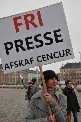 Copenhagen, Denmark. 23 February 2021, Danes proetesting againest coronavirus pandemic new debate in danish parliamenet about quick corona virus pandemic law in danish parliament with all political parties and stage anti pandemic law debates in front of danish parliament and danish police stand peaceful proteact danish parliament in front christiansborg danish parliament in Copenhagen. (Photo..Francis Dean Deanpictures)