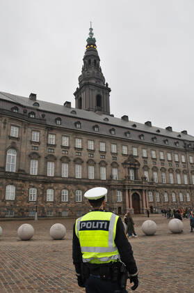 Copenhagen, Denmark. 23 February 2021, Danes proetesting againest coronavirus pandemic new debate in danish parliamenet about quick corona virus pandemic law in danish parliament with all political parties and stage anti pandemic law debates in front of danish parliament and danish police stand peaceful proteact danish parliament in front christiansborg danish parliament in Copenhagen. (Photo..Francis Dean Deanpictures)