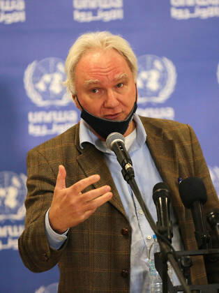 February 24, 2021, Gaza city, Gaza Strip, Palestinian Territory: Director of UNRWA Affairs in Gaza strip, Matthias Schmale, speaks before receiving a dose of coronavirus disease (COVID-19) vaccine at a UN clinic in Gaza City, on February 24, 2021. Palestinians in Gaza began a limited COVID-19 vaccination programme on Monday after receiving doses donated by Russia and the United Arab Emirates, but a wider campaign could be further off as health officials await larger shipments Gaza city Palestinian Territory - ZUMAap3_ 20210224_zaf_ap3_011 Copyright: xAshrafxAmrax