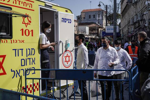 February 24, 2021, Jerusalem, Israel: The IDF Home Front Command in coordination with Magen David Adom, serving as the Israeli Red Cross organization and leading EMS, make COVID-19 vaccinating more accessible to those still in denial or refusal operating a mobile vaccination station out of a caravan at JerusalemÃ¢â‚¬â ¢s Shuk Mahane Yehuda Market. Jerusalem Israel - ZUMAa126 20210224_zap_a126_004 Copyright: xNirxAlonx