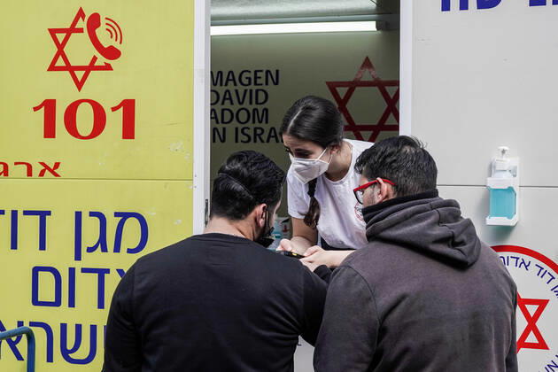 February 24, 2021, Jerusalem, Israel: The IDF Home Front Command in coordination with Magen David Adom, serving as the Israeli Red Cross organization and leading EMS, make COVID-19 vaccinating more accessible to those still in denial or refusal operating a mobile vaccination station out of a caravan at JerusalemÃ¢â‚¬â ¢s Shuk Mahane Yehuda Market. Jerusalem Israel - ZUMAa126 20210224_zap_a126_010 Copyright: xNirxAlonx