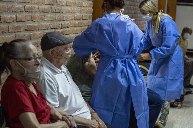February 25, 2021, Firmat, Santa Fe, Argentina: Nurse apply a shot of India s Serum Institute Covishield vaccine against COVID-19 to elderly people inside a makeshift care home functioning in a special school. The original care home inside San Martin Hospital was converted into the COVID-19 sector at the beginning of the pandemic, and the residents were moved into this location. Firmat Argentina - ZUMAm105 20210225_zaf_m105_010 Copyright: xPatricioxMurphyx