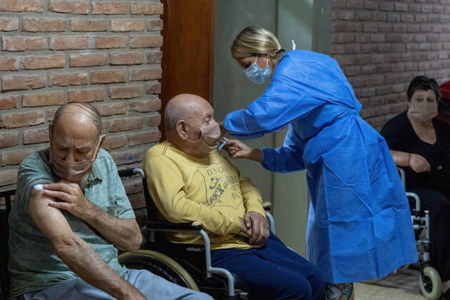 February 25, 2021, Firmat, Santa Fe, Argentina: A nurse applies India s Serum Institute Covishield vaccine against COVID-19 to an elderly man in a makeshift care home at a special school..The original care home inside San Martin Hospital was converted into the COVID-19 sector at the beginning of the pandemic and residents were transferred to a special school. Firmat Argentina - ZUMAs197 20210225_zaa_s197_113 Copyright: xPatricioxMurphyx