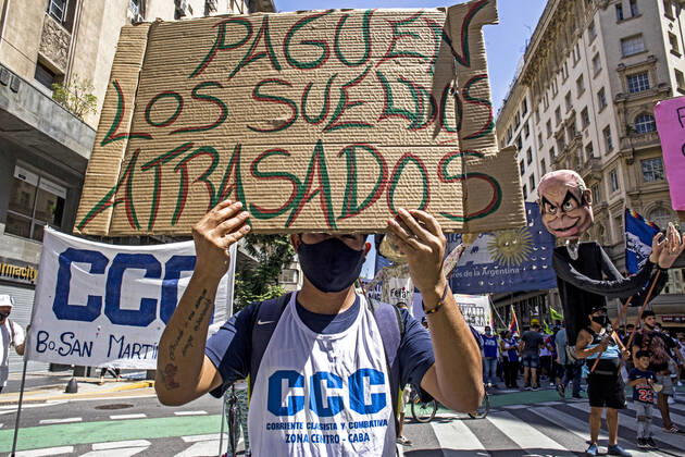 February 25, 2021, Buenos Aires, Federal Capital, Argentina: Different social organizations gathered, in the center of the City of Buenos Aires, to demand the continuity of employment of 2,500 cooperative members of the Clean Sideways Program of the Government of the City of Buenos Aires, among other demands. Buenos Aires Argentina - ZUMAa179 20210225_zap_a179_002 Copyright: xRobertoxAlmeidaxAveledox