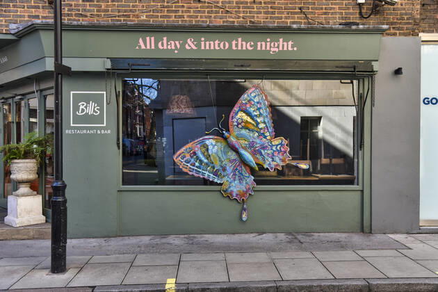 February 26, 2021, London, United Kingdom: General view of a giant butterfly on Bills restaurant in Soho, London which remains shut due to the third national lockdown due to the Coronavirus pandemic. London United Kingdom - ZUMAs197 20210226_zaa_s197_288 Copyright: xDavexRushenx