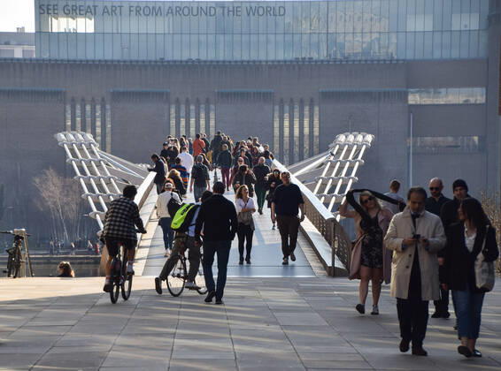 February 27, 2021, London, United Kingdom: People walk along Millennium Bridge in London..The coronavirus alert level has dropped in England, prompting people to gather outside despite the lockdown restrictions still being in place across the country. London United Kingdom - ZUMAs197 20210227_zaa_s197_135 Copyright: xVukxValcicx