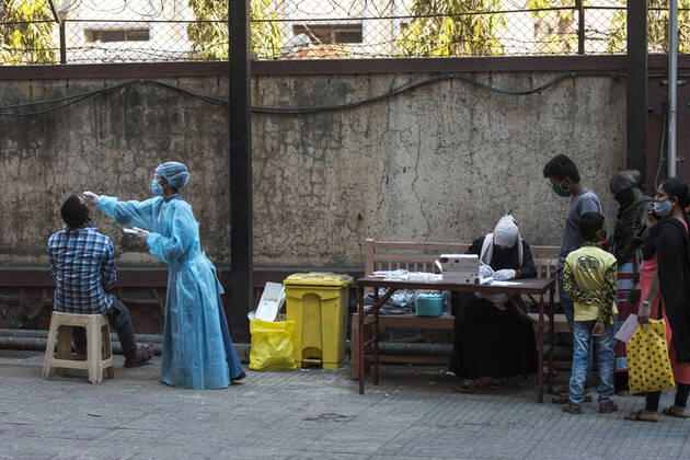 MUMBAI, INDIA - FEBRUARY 27: Healthcare worker during swab test of the people at Govandi, on February 27, 2021 in Mumbai, India. (Photo by Pratik Chorge Hindustan Times) Medical Team Conducts COVID-19 Coronavirus Test