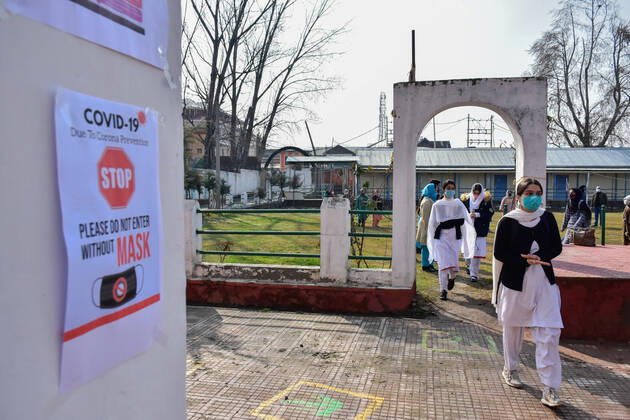 March 1, 2021, Srinagar, India: Kashmiri students walk inside the school premises as the schools reopened after one year of break due to the coronavirus pandemic in Srinagar..The schools in Kashmir have reopened for students of classes 9 to 12 after being shut down for nearly one year due to the coronavirus pandemic. Even before the Covid-19 forced their closure, the educational institutes remained closed for nearly a year on of the security and communication clampdown following the abrogation of Article 370 on 5 August 2019. Meanwhile, Jammu and Kashmir recorded 97 new Covid-19 cases taking the infection tally to 1,26,383, officials said. Srinagar India - ZUMAs197 20210301_zaa_s197_058 Copyright: xSaqibxMajeedx