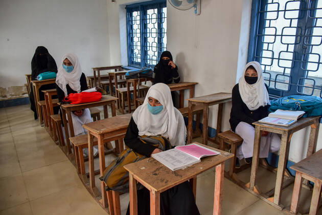 March 1, 2021, Srinagar, India: Kashmiri students attend a class as the schools reopened after one year of break due to the coronavirus pandemic in Srinagar..The schools in Kashmir have reopened for students of classes 9 to 12 after being shut down for nearly one year due to the coronavirus pandemic. Even before the Covid-19 forced their closure, the educational institutes remained closed for nearly a year on of the security and communication clampdown following the abrogation of Article 370 on 5 August 2019. Meanwhile, Jammu and Kashmir recorded 97 new Covid-19 cases taking the infection tally to 1,26,383, officials said. Srinagar India - ZUMAs197 20210301_zaa_s197_061 Copyright: xSaqibxMajeedx