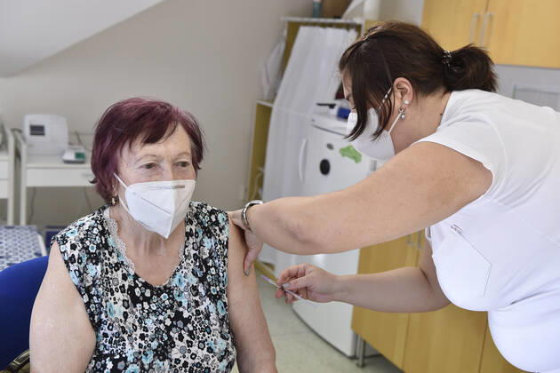 An elderly woman receives a vaccine against the covid-19 at the surgery office in Moravska Nova Ves in Breclav region, Czech Republic, March 1, 2021. (CTKxPhoto VaclavxSalek) CTKPhotoP202103010739801  sal 02