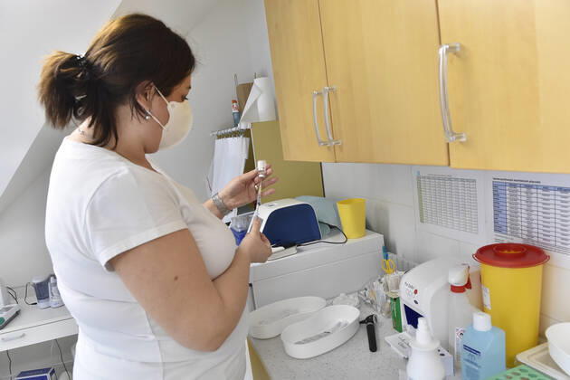 A nurse prepares a vaccine against the covid-19 at the surgery office in Moravska Nova Ves in Breclav region, Czech Republic, March 1, 2021. (CTKxPhoto VaclavxSalek) CTKPhotoP202103010742901  sal 06