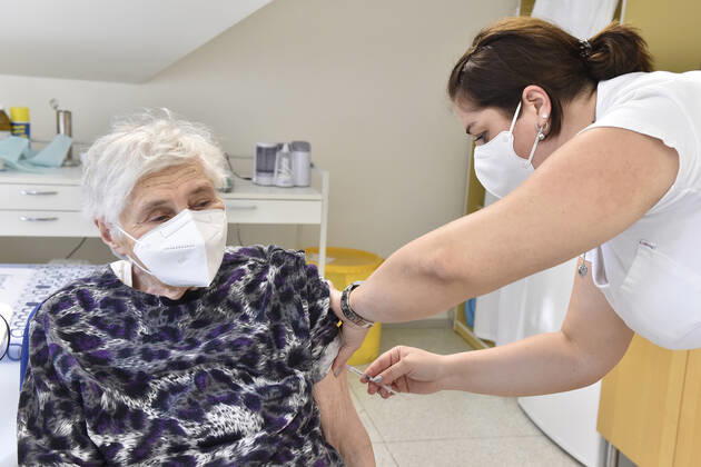 An elderly woman receives a vaccine against the covid-19 at the surgery office in Moravska Nova Ves in Breclav region, Czech Republic, March 1, 2021. (CTKxPhoto VaclavxSalek) CTKPhotoP202103010745701  sal 03