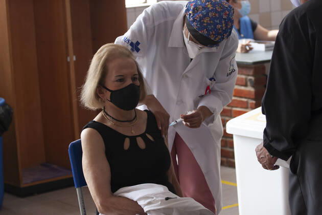 Vaccination of elderly people over 80 years old in Sao Paulo. Vaccination of elderly people over 80 years old in Sao Paulo. March 1, 2021, Sao Paulo, Brazil: Vaccination against Covid-19 of elderly people aged over 80 at UBS HUMAITA (Basic Health Unit) in Bela Vista, Sao Paulo, which uses the EMEF CELSO LEITE RIBEIRO FILHO school next to the unit as a vaccination site in Sao Paulo. Vaccination of elderly people over 80 years old in Sao Paulo.  Copyright: xLecoxVianax