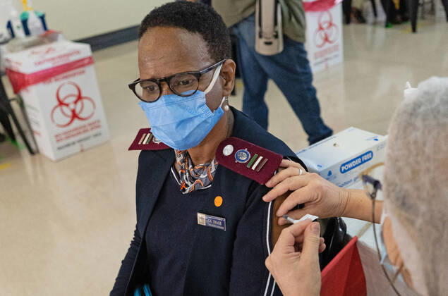 (210303) -- JOHANNESBURG, March 3, 2021 -- A health worker receives COVID-19 vaccine in Charlottle Maxeke Academic Hospital in Johannesburg, South Africa, March 2, 2021. As COVID-19 cases decline, South African cabinet eased lockdown restrictions from alert level three to level one, allowing political and religious gatherings, President Cyril Ramaphosa said on Sunday night. (Photo by Xinhua) SOUTH AFRICA-JOHANNESBURG-COVID-19-VACCINATION MatthewxMartinxBrink 