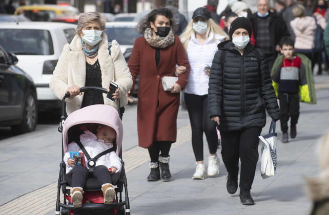 People wearing face masks walk on a street in Ankara, Turkey, on march 2, 2021. Turkey has confirmed 28,706 deaths and 2,723,316 positive cases of the coronavirus infection in the country. (Abdurrahman Antakyali Depo Photos) Copyright: AbdurrahmanxAntakyalix-xDepoxPho 17052894