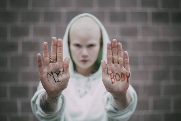 My body text written on palms of female activist Sweden, Stockholm, model released Copyright: xMaskotx , MA84414