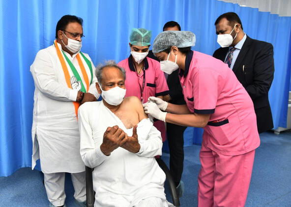 COVID-19 Vaccination Drive In Rajasthan, India Rajasthan Chief Minister Ashok Gehlot being administered the COVID-19 vaccine, during a countrywide inoculation drive, at SMS Hospital in Jaipur. The second phase of the COVID-19 vaccination drive started for people 60 years of age and above. Jaipur Rajasthan India Copyright: SumitxSaraswat