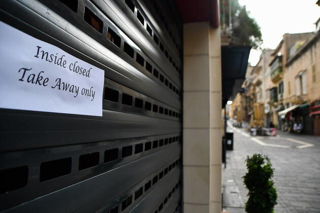 (210305) -- VALLETTA, March 5, 2021 -- Photo taken on March 5, 2021 shows a take away only sign on a restaurant in Valletta, Malta. Malta has ordered the closure of the country s restaurants along with clubs, bars and places of entertainment until April 11 in a raft of measures to contain the spread of COVID-19, Prime Minister Robert Abela said on Thursday. (Photo by Xinhua) MALTA-VALLETTA-COVID-19-MEASURES JonathanxBorg 
