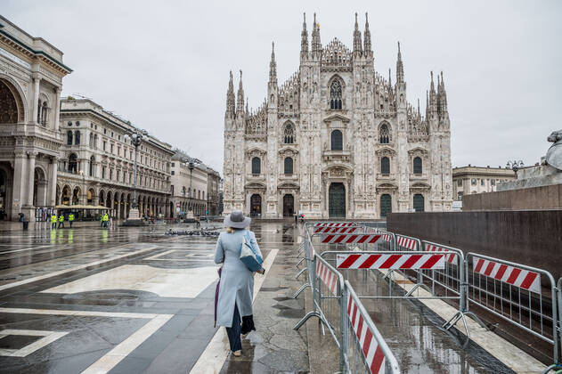Milan. Dark Orange Zone few people in the street through the streets of the center Editorial Usage Only  Copyright: xCarloxCozzolix xIPAx