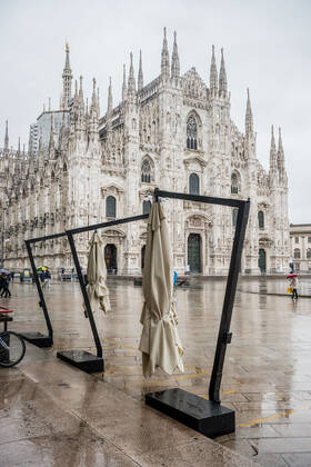 Milan. Dark Orange Zone few people in the street through the streets of the center In the photo closed bars in Piazza Duomo Editorial Usage Only  Copyright: xCarloxCozzolix xIPAx